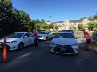 Doug and Jeanine Parking Lot Check in